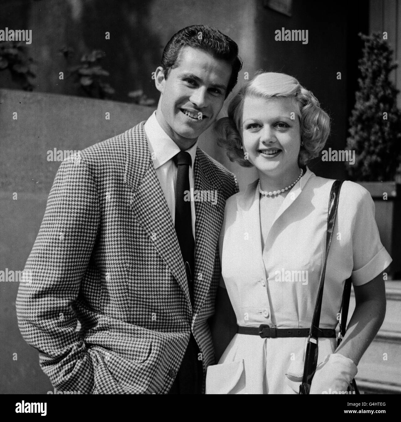 ANGELA LANSBURY & FIANCE. Actress Angela Lansbury with her actor fiance Peter Shaw, in London. Stock Photo
