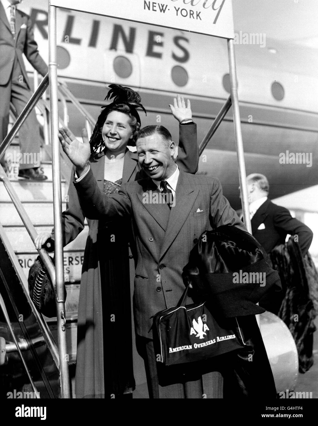 MARCH 6: George Formby died aged 56, after suffering a heart attack. His contribution to the war effort earned Formby an OBE in 1946.He is pictured here with his wife, Beryl. Stock Photo