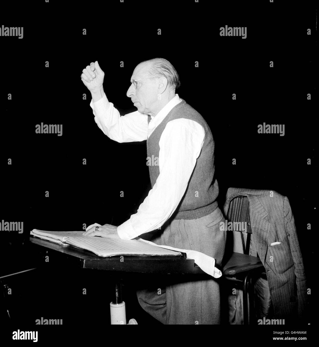 Russian-born composer Igor Stravinsky (1882-1971) rehearsing the Royal Philharmonic Orchestra at the Royal Festival Hall in London, for concert of his own works. Stock Photo