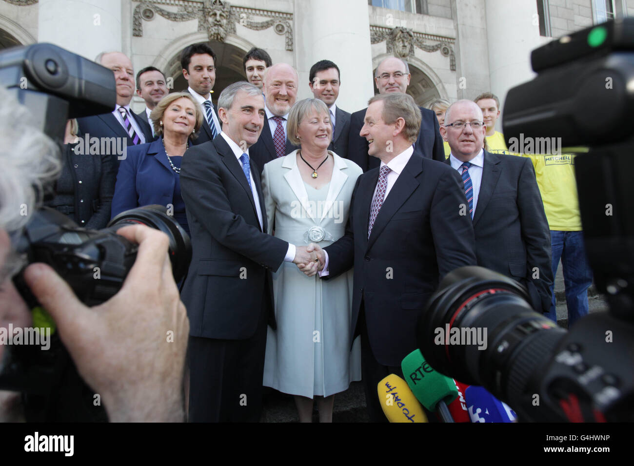 Fine Gael presidential candidate Gay Mitchell joins Taoiseach Enda Kenny to hand his nomination papers in at the Custom House in Dublin today. Stock Photo