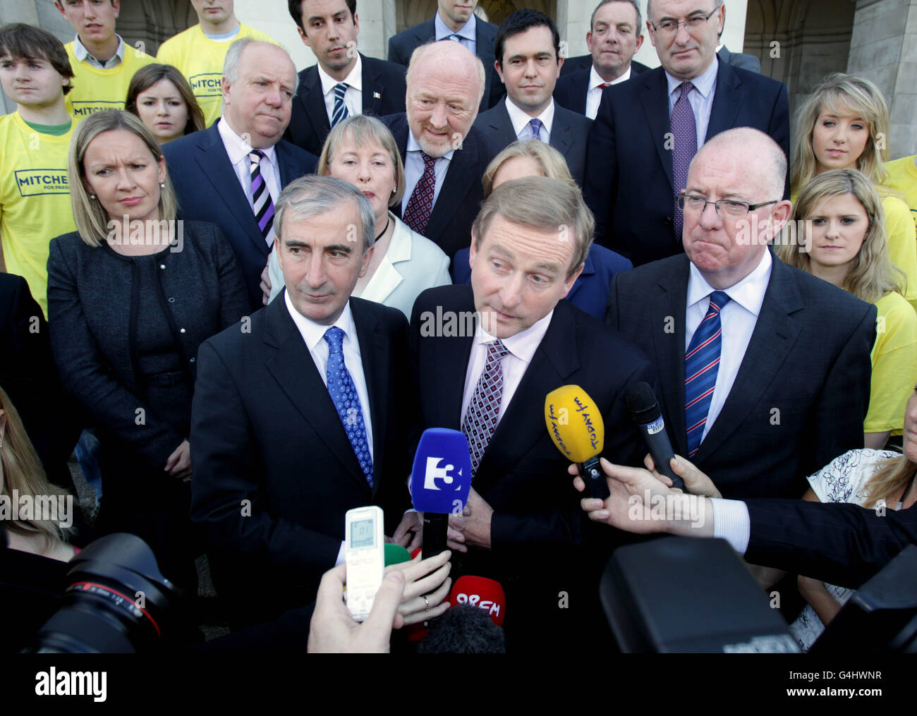 Fine Gael presidential candidate Gay Mitchell joins Taoiseach Enda Kenny to hand his nomination papers in at the Custom House in Dublin today. Stock Photo