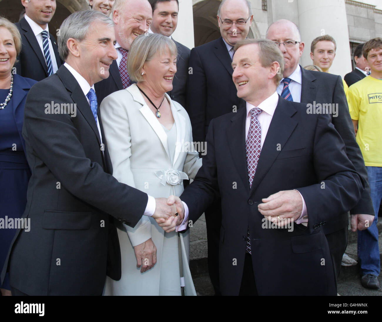 Fine Gael presidential candidate Gay Mitchell joins Taoiseach Enda Kenny to hand his nomination papers in at the Custom House in Dublin today. Stock Photo