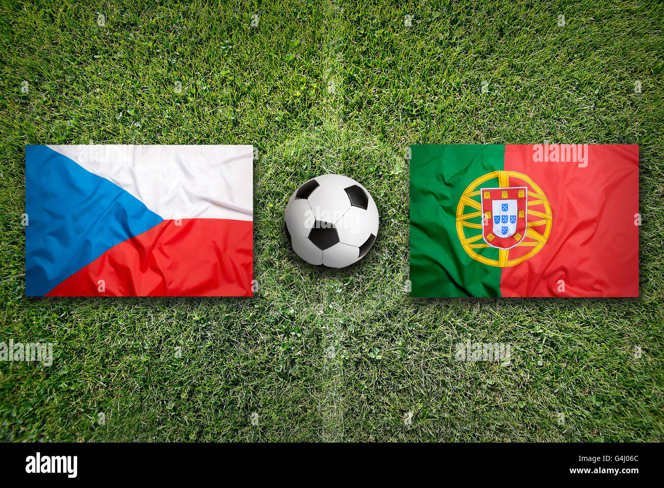 Czech Republic vs. Portugal flags on green soccer field Stock Photo
