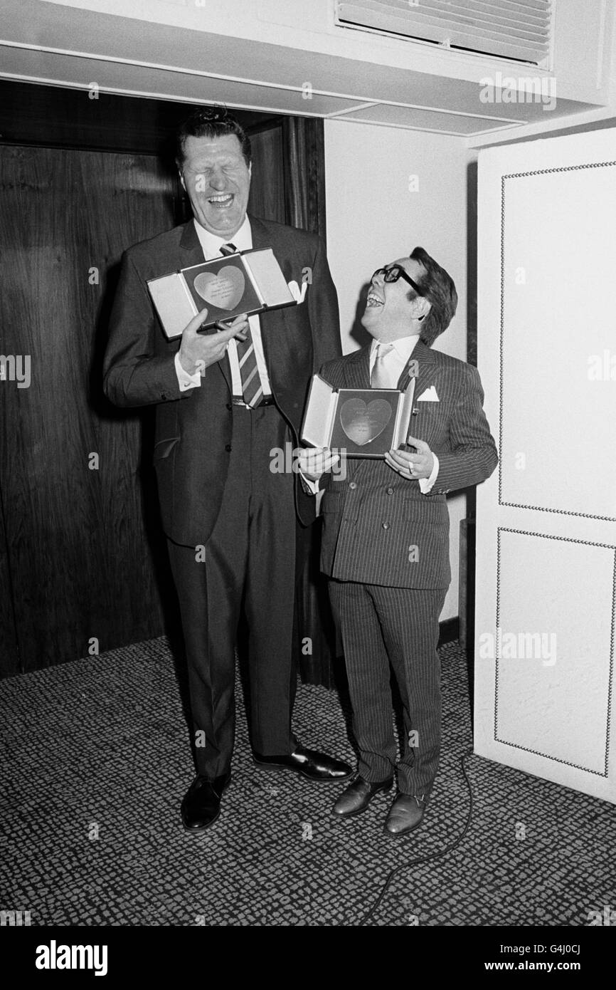 The Two winners of the Variety Club of Great Britain's Silver Heart Award for 'ITV Personality of the Year 1968,' comedian and magician Tommy Cooper (right) and comedian Ronnie Corbett. Stock Photo