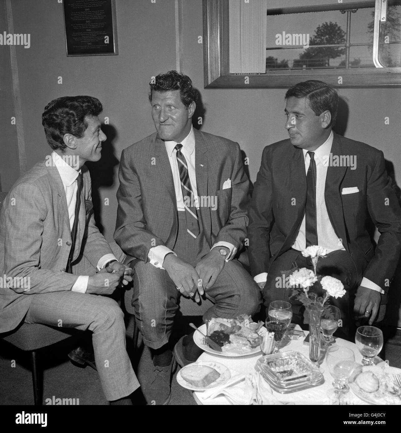 Stars of the new television show 'Blackpool Night Out,' which is to replace 'Sunday Night at the London Palladium' on ITV. Artists who are to appear, and are attending a reception at ABC's Teddington Studios, Middlesex, are Mike (left) and Bernie (far right) Winters, hosts of the programme, resident star Lionel Blair and guest star Tommy Cooper (centre) Stock Photo