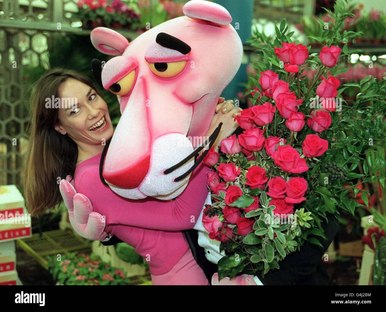 The Pink Panther, who celebrates his 35th birthday this year and Tara Palmer Tomkinson in London's New Covent Garden Flower Market. The pink-furred cat has released his 'Top Ten Wooing Tips' to help the cause of the British male for Valentine's Day. Stock Photo