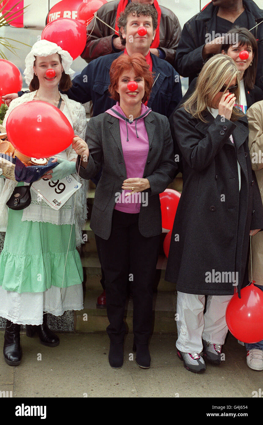 Ruby Wax (Front Centre), with Nicole Appleton, (Front, Right) Emma Freud (Back, Right) and Actor Paul Bradley (Back Centre) wearing red noses as they get ready to take part in the Comic Relief Red Nose Run in London to help raise money for the charity. Stock Photo
