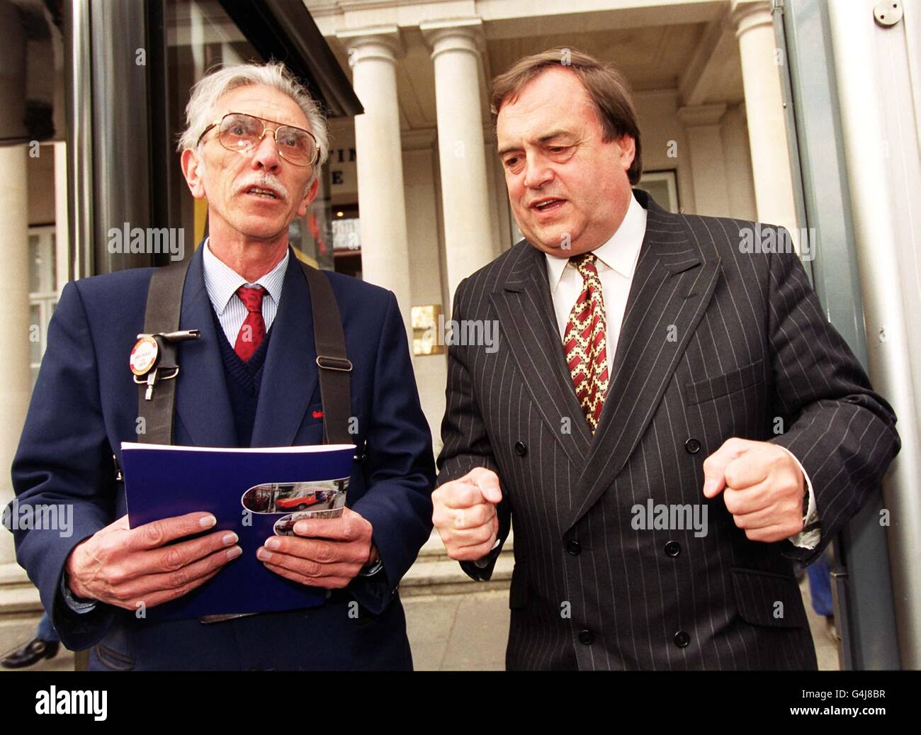 Deputy Prime Minister John Prescott with bus conductor Ian McKay of the Centre West Bus Company in central London after he launched a document entitled From Workhorse to Thoroughbred , a policy statement on buses. * which is a follow-up to the Government's transport White Paper published last year. The document proposes a guaranteed concession of at least half-fare on local buses in England Wales, but on payment of an annual fee of up to 5. Scotland s concessionary fares will be a matter for the Scottish Parliament. Stock Photo