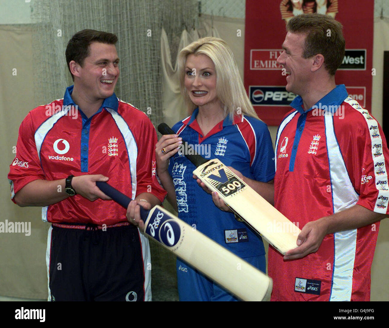 England representative cricketers Darren Gough (left) and Alec Stewart with model Caprice during a photocall at Lords to launch the Cricket World Cup. Stock Photo