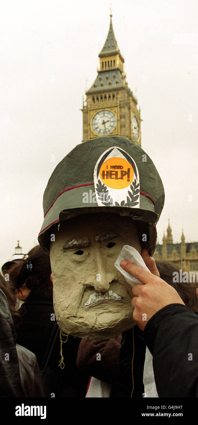Chilean anti Pinochet demonstrators outside the Commons react as the verdict on his extradition was read out. The law Lords ruled that General Pinochet must remain in Britain and face extradition charges to Spain. Stock Photo