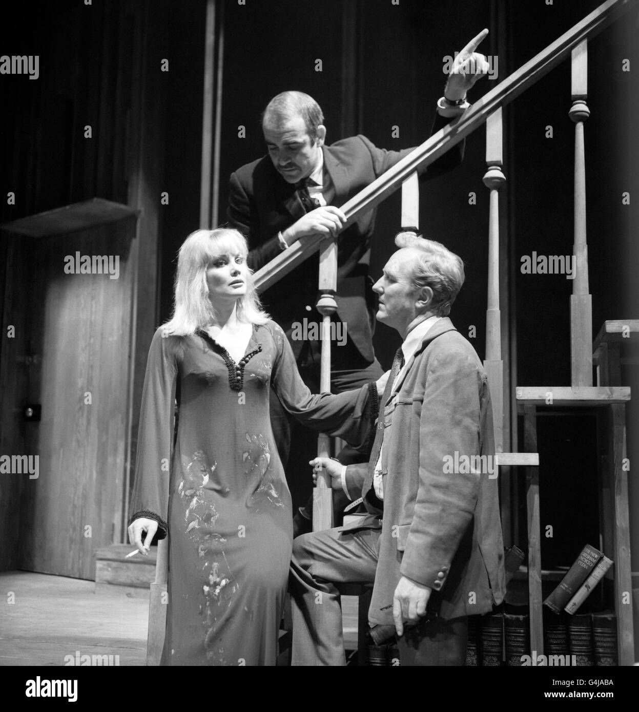 Sean Connery, making his West End debut as a director, indicates the action he wants from his wife, Diane Cilento and Robert Hardy in a scene from 'I've Seen You Cut Lemons', at the Fortune Theatre, Drury Lane. Stock Photo