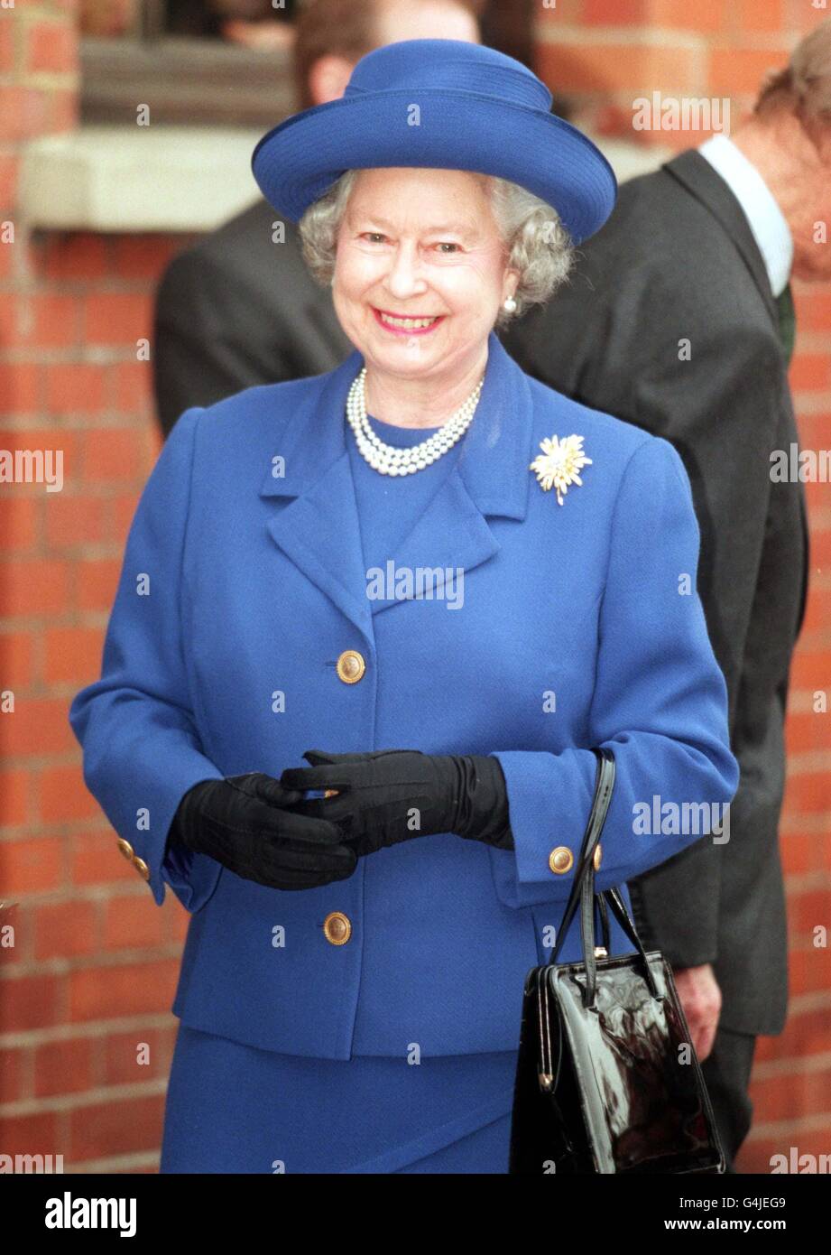 Her Majesty the Queen visiting costume and production department Angels and Berman in Camden, London where she was shown costumes from the film 'Shakespeare in Love' today (Thursday). SUN ROTA PICTURE BY PAUL EDWARDS Stock Photo