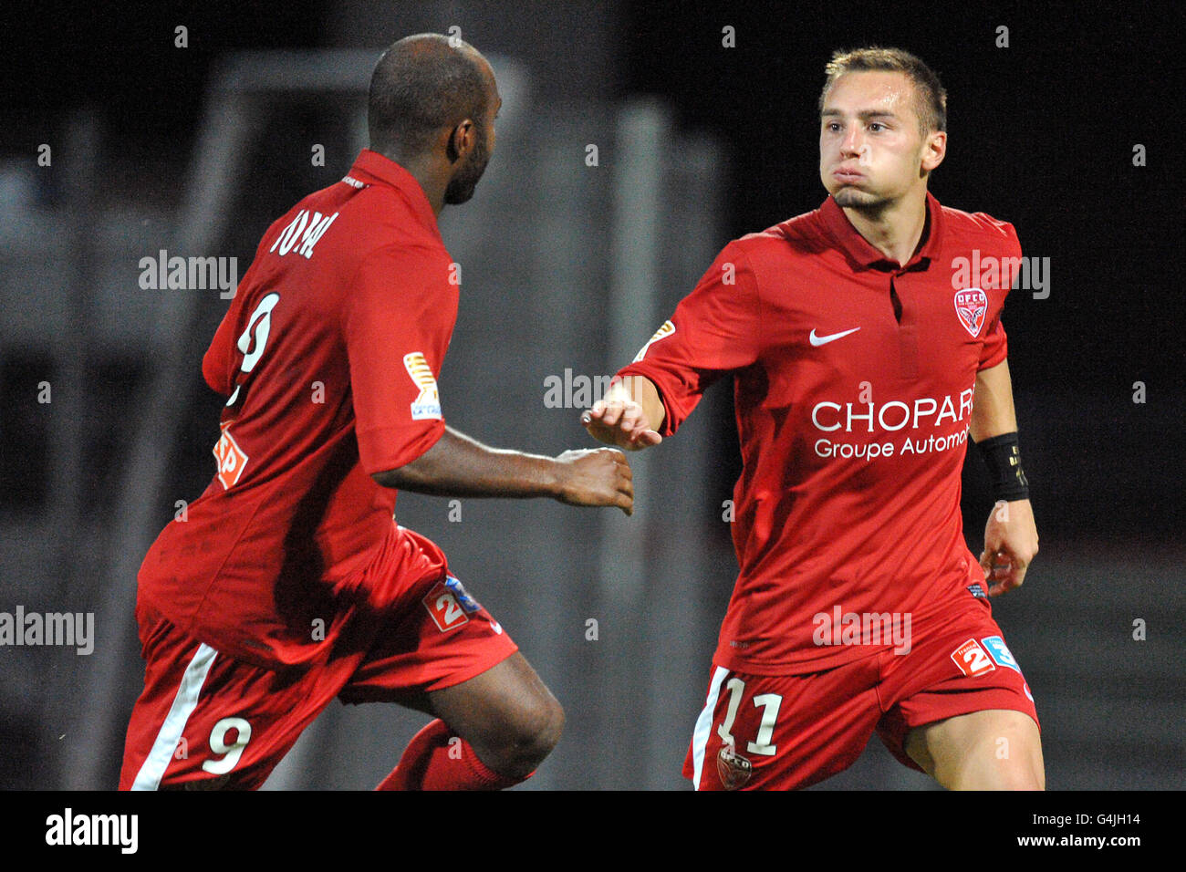 Dijon's Brice Jovial (left) congratulates teammate Eric Bautheac