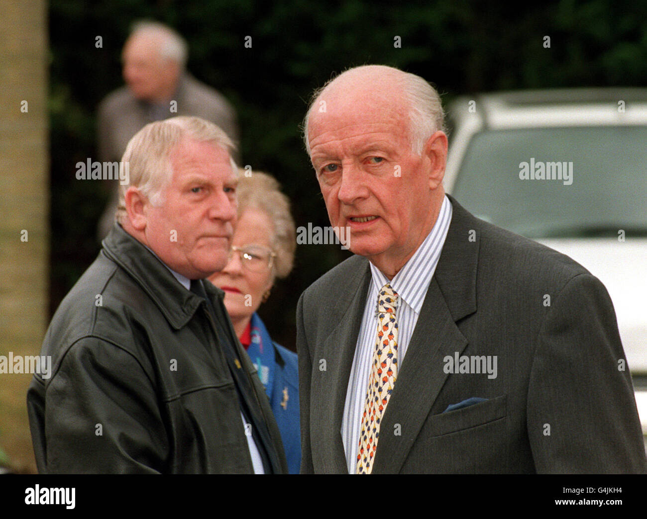 TV celebrity Frank Bough (R) arrives for the funeral of one of Britain's best loved comedians, Ernie Wise, at Slough Crematorium, Berkshire. Stock Photo