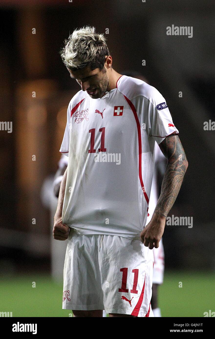 Soccer - UEFA Euro 2012 - Qualifying - Group G - Wales v Switzerland - Liberty Stadium. Switzerland's Valon Behrami stands dejected after the final whistle Stock Photo