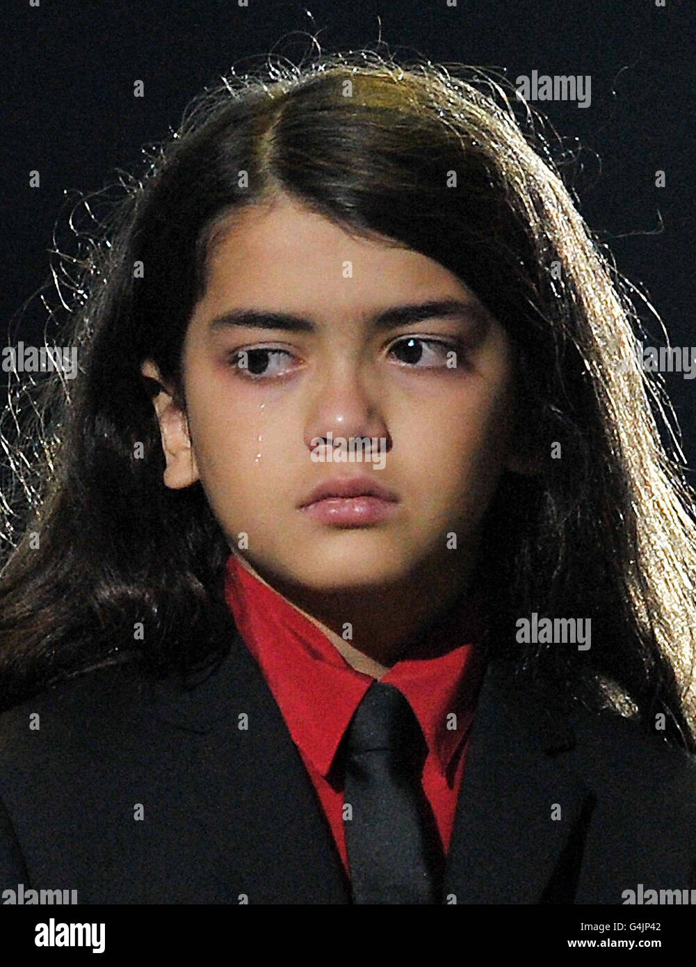 Michael Jackson's child Blanket sheds a tear at the Michael Forever Tribute Concert at the Millennium Stadium, Cardiff. Stock Photo