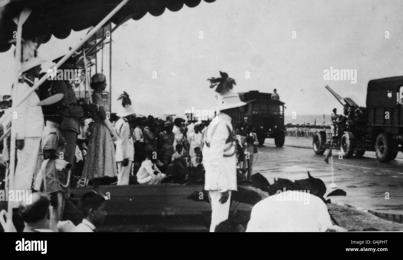 The Queen watches anti-aircraft units passing during a military review on Galle Face Green, Colombo, Sri Lanka, on her 28th birthday. Stock Photo