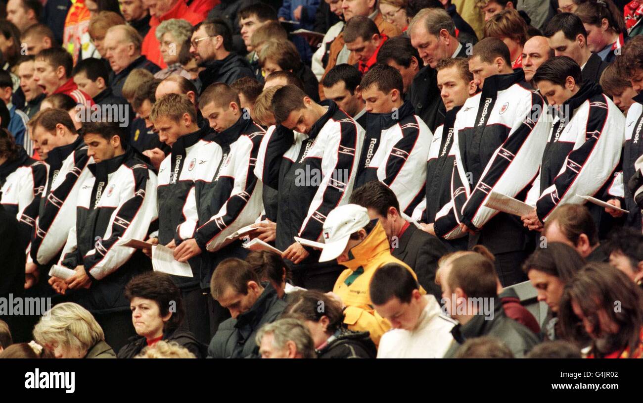 Members of the present Liverpool FC Squad take their place on the Kop at Anfield, for the 10th Anniversary Hillsborough memorial service, in honour of the 96 fans who lost their lives at the Sheffield Wednesday ground. Stock Photo