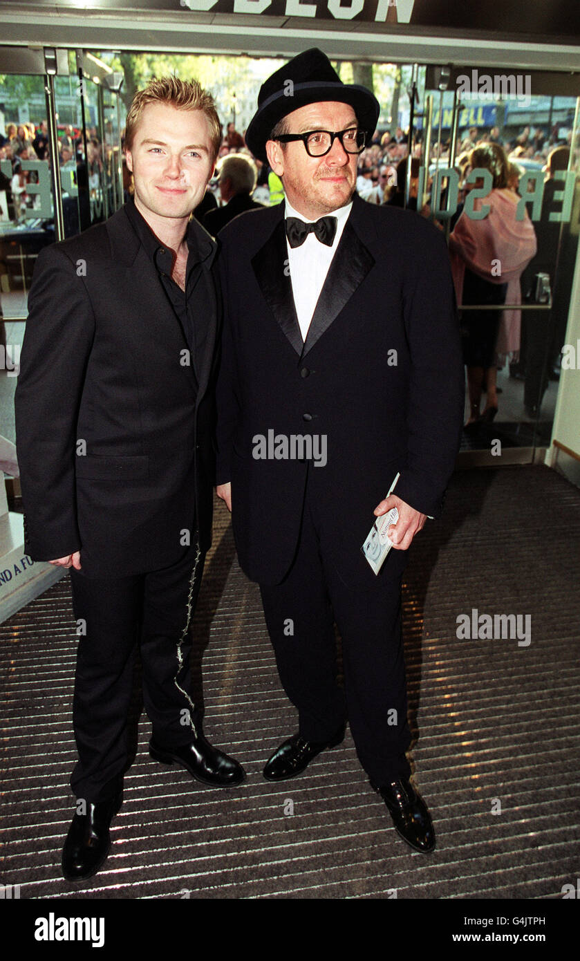 Rock stars Ronan Keating, of Boyzone, and Elvis Costello, arriving for
