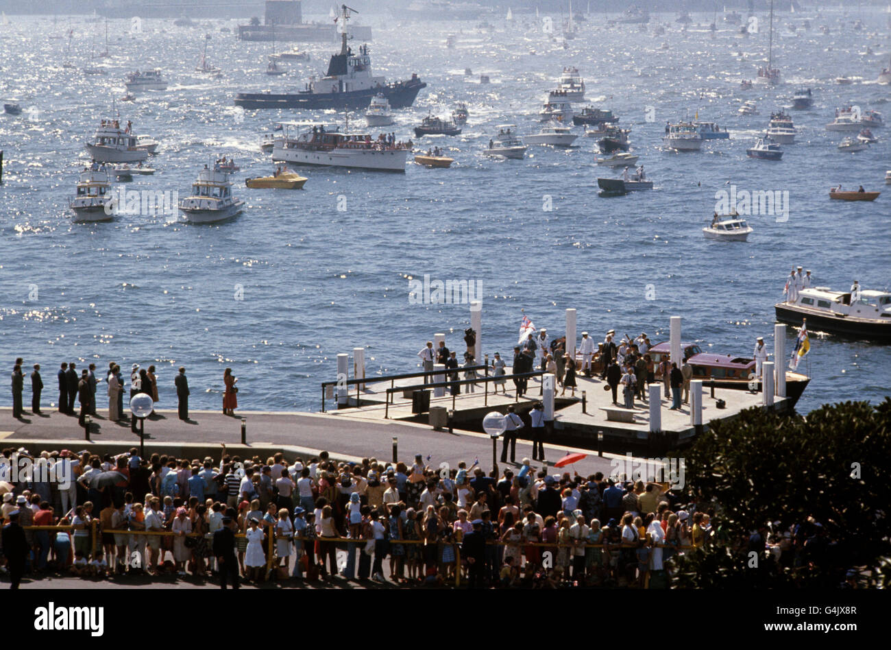 Queen Elizabeth II and the Duke of Edinburgh landing at Man O'War Steps, Sydney, after coming ashore from the Royal Yacht Britannia in the Royal Barge. Stock Photo