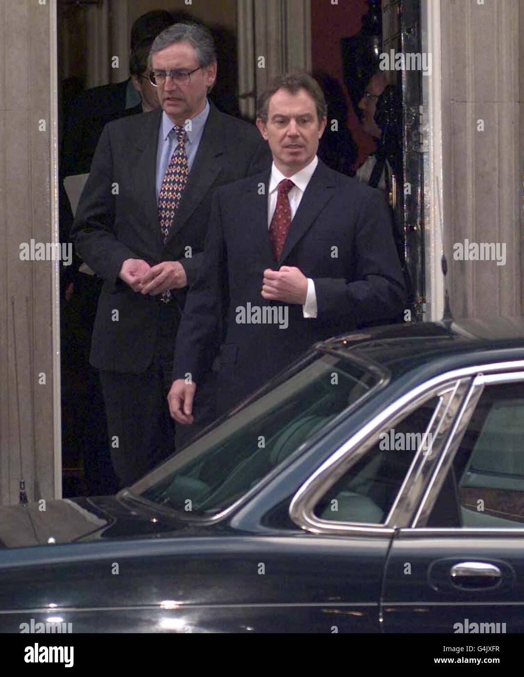 Britain's Prime Minister Tony Blair leaving 10 Downing Street in Westminster, London, en route to the House of Commons, where Chancellor of the Exchequer Gordon Brown is to deliver his third Budget. Stock Photo