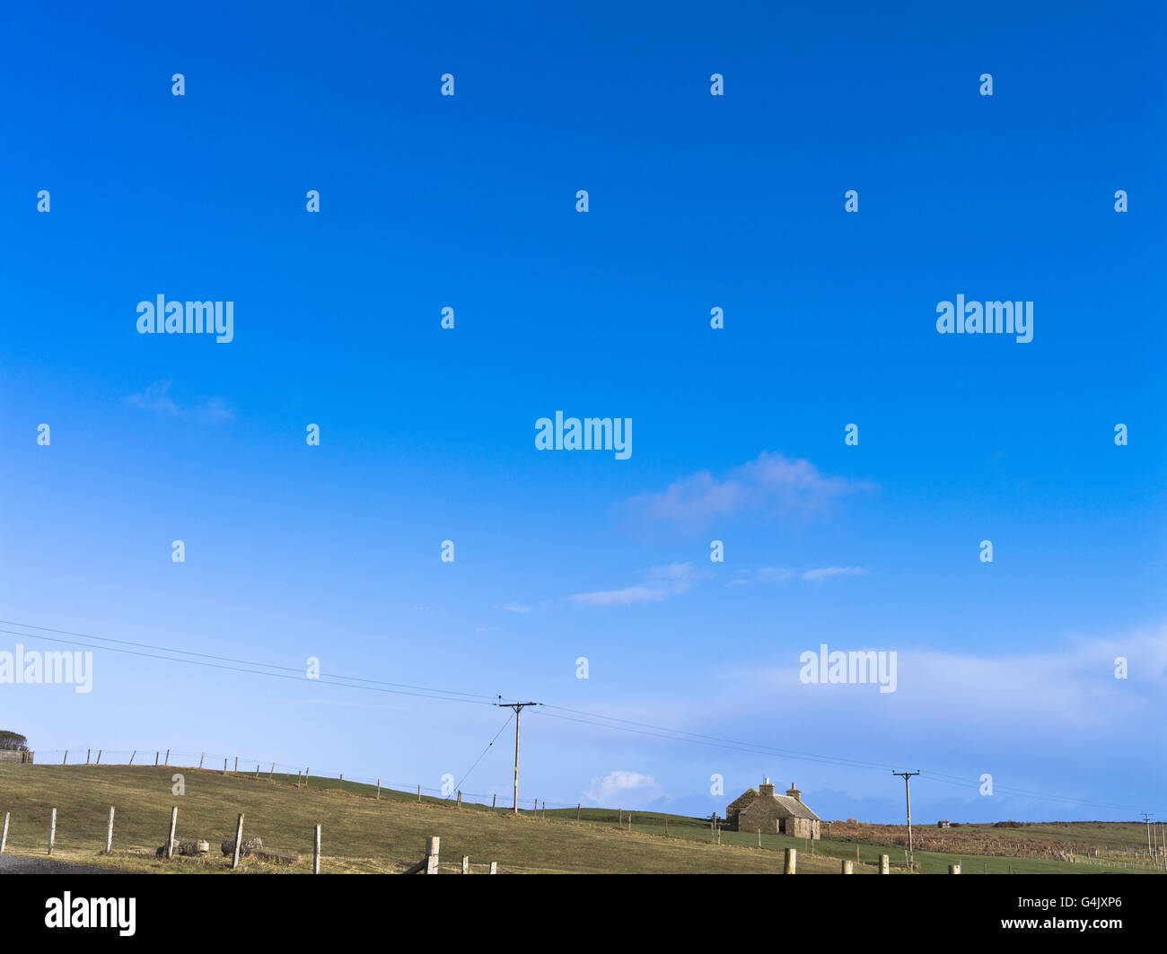 dh  ORPHIR ORKNEY Croft rural cottage isolated blue sky ruined scotland Stock Photo