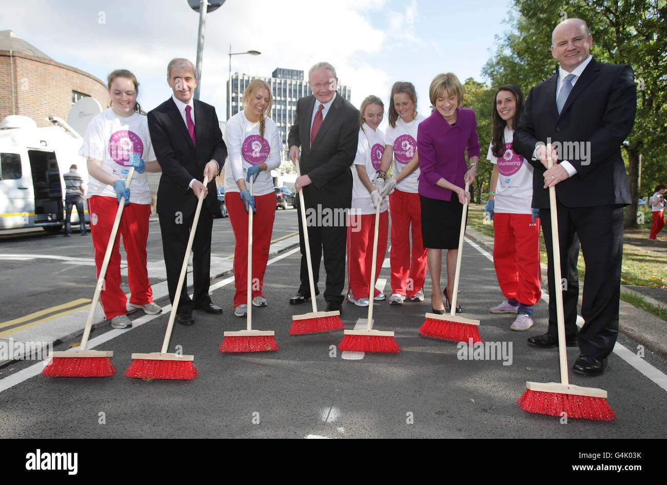 Presidential candidates (from left to right) Gay Mitchell, Martin McGuinness, Mary Davis and Sean Gallagher are joined by members of Volunteer Ireland to clean up Dublin's Grand Canal to mark National Volunteer Day. Stock Photo