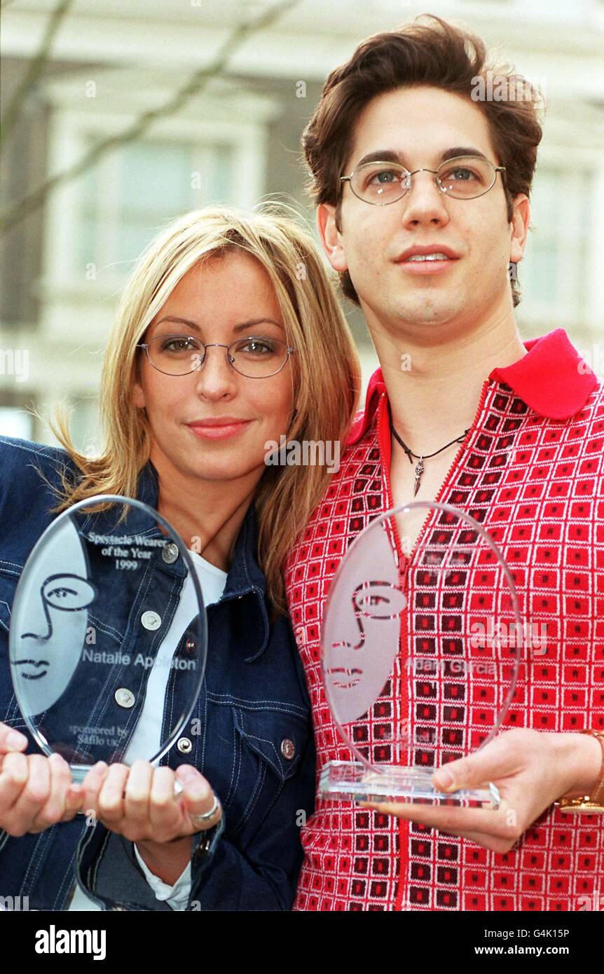 Natalie Appleton from the all-girl band 'All Saints' in London with Adam Garcia, star of the musical 'Saturday Night Fever', after they were named Female and Male Safilo/Hello Spectacle Wearers of the Year. Stock Photo