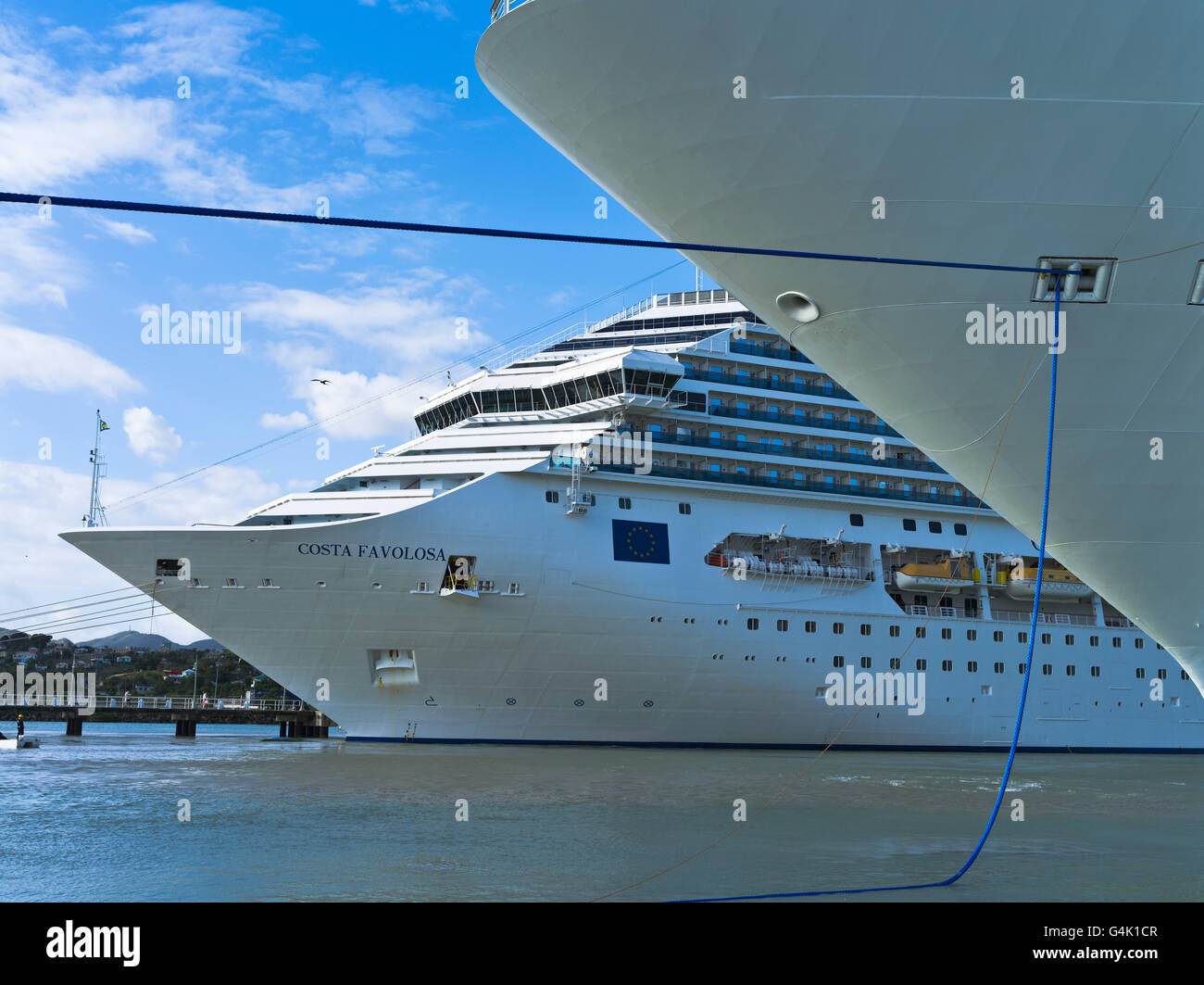 dh  CRUISE SHIPS CARIBBEAN Berthed cruise ships bows Costa Favolosa cruises moored ship Stock Photo