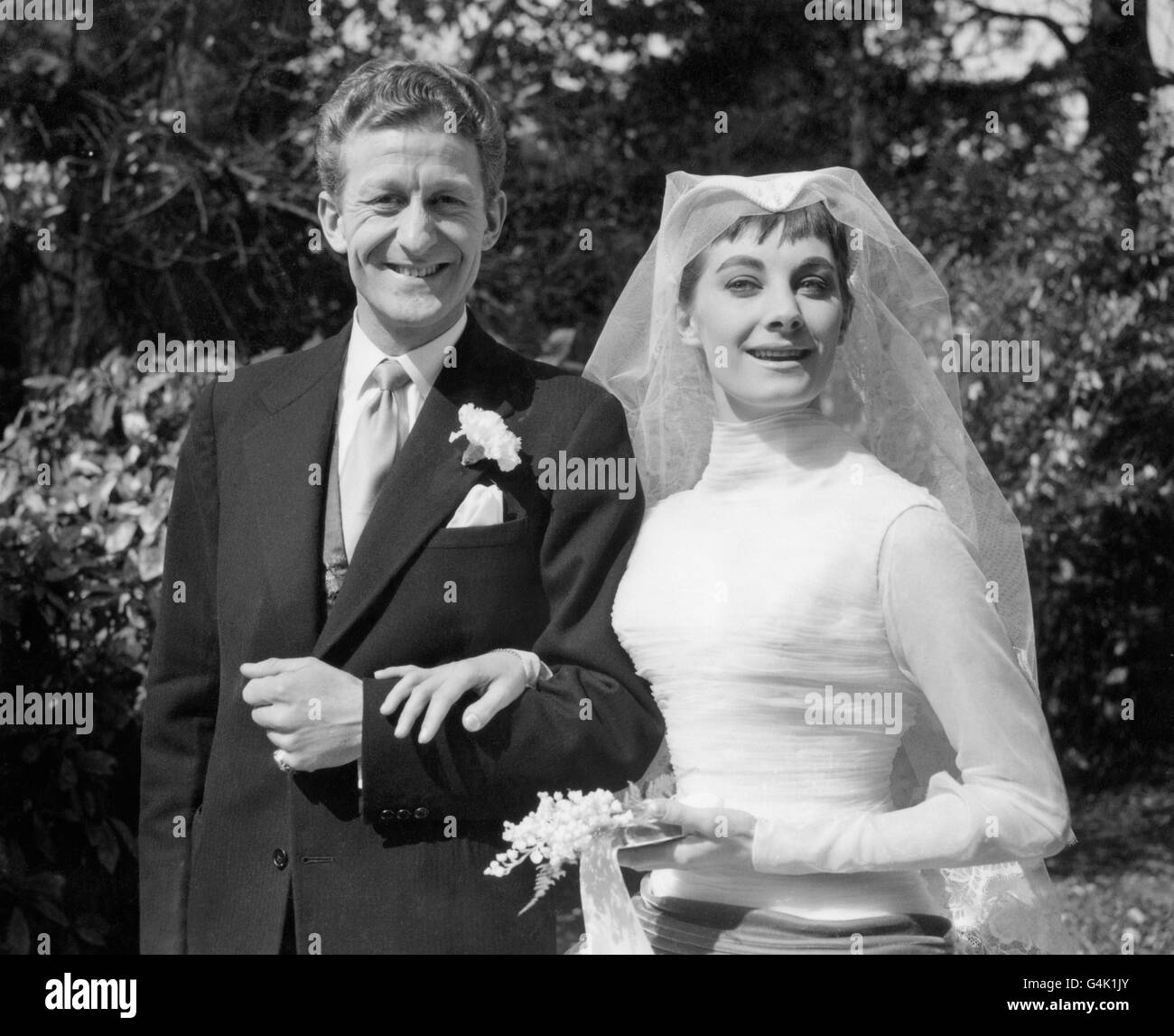 Actor Jon Pertwee, 35, and his bride, actress Jean Marsh, 20, leaving St Nicholas Church, Shepperton, after their wedding. Stock Photo