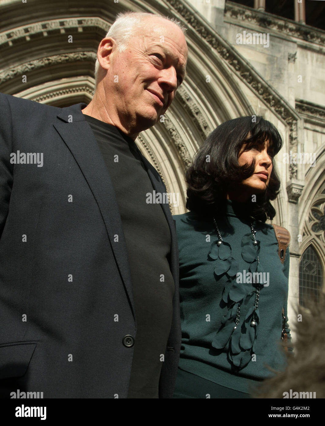 David Gilmour and wife Polly Samson, the parents of Charlie Gilmour, leave the Royal Courts of Justice, London, after hearing a plea on behalf of their son for a cut in his 16-month jail sentence for going on a drink and drug-fuelled rampage at a student fees protest. Stock Photo