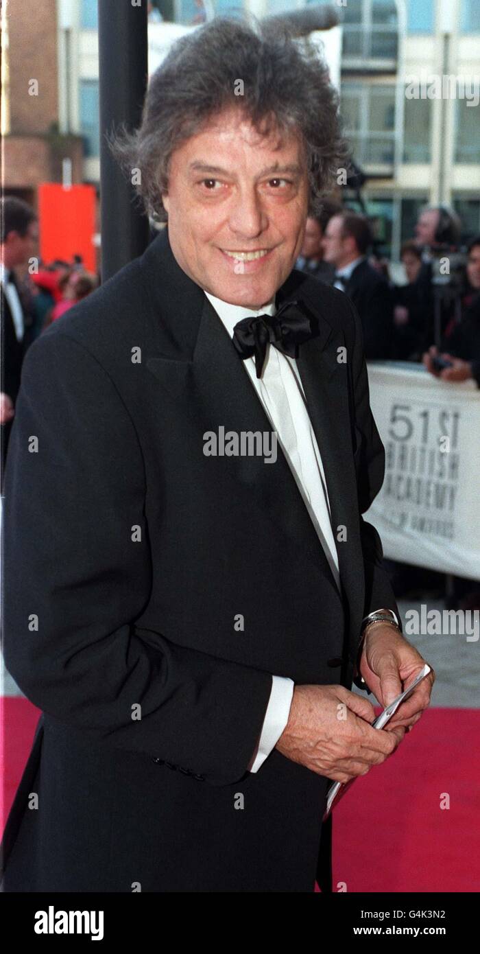 Writer Tom Stoppard, who won the Oscar for Best Original Screenplay for 'Shakespeare in Love', arrives for the 51st BAFTA Film Awards at the Business Design Centre in London. Stock Photo