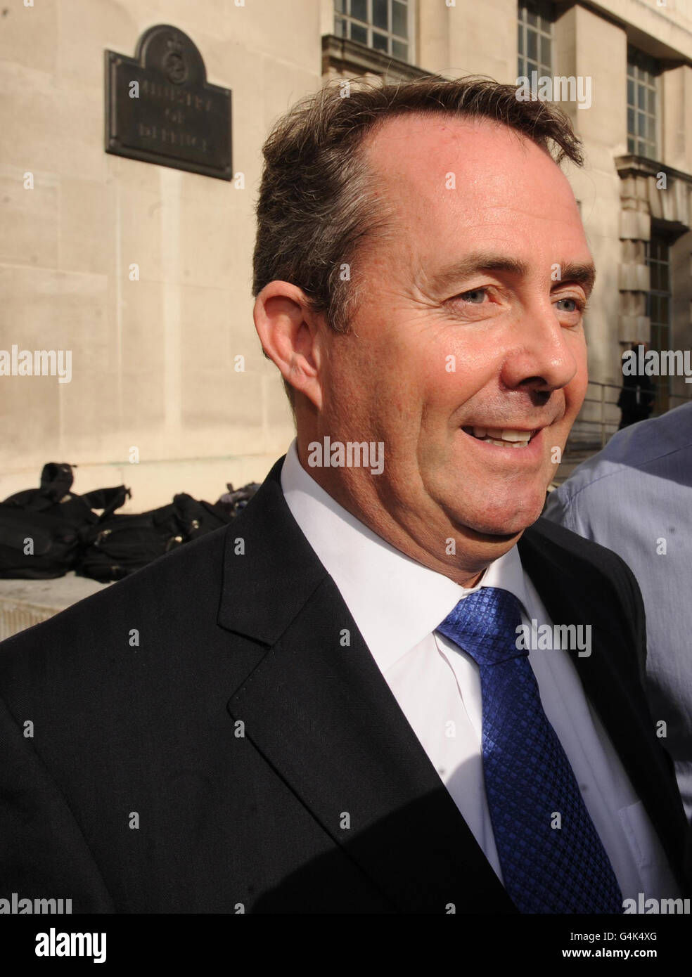 Defence Secretary Liam Fox leaves the Ministry of Defence in London today to face questions in the House of Commons. Stock Photo