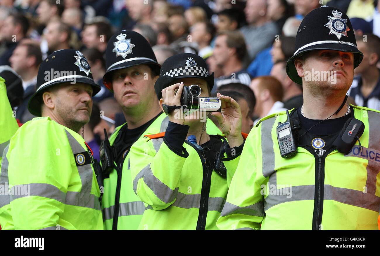 Soccer - Barclays Premier League - West Bromwich Albion v Wolverhampton Wanderers - The Hawthorns. Police monitor the fans in the stands with a video camera Stock Photo