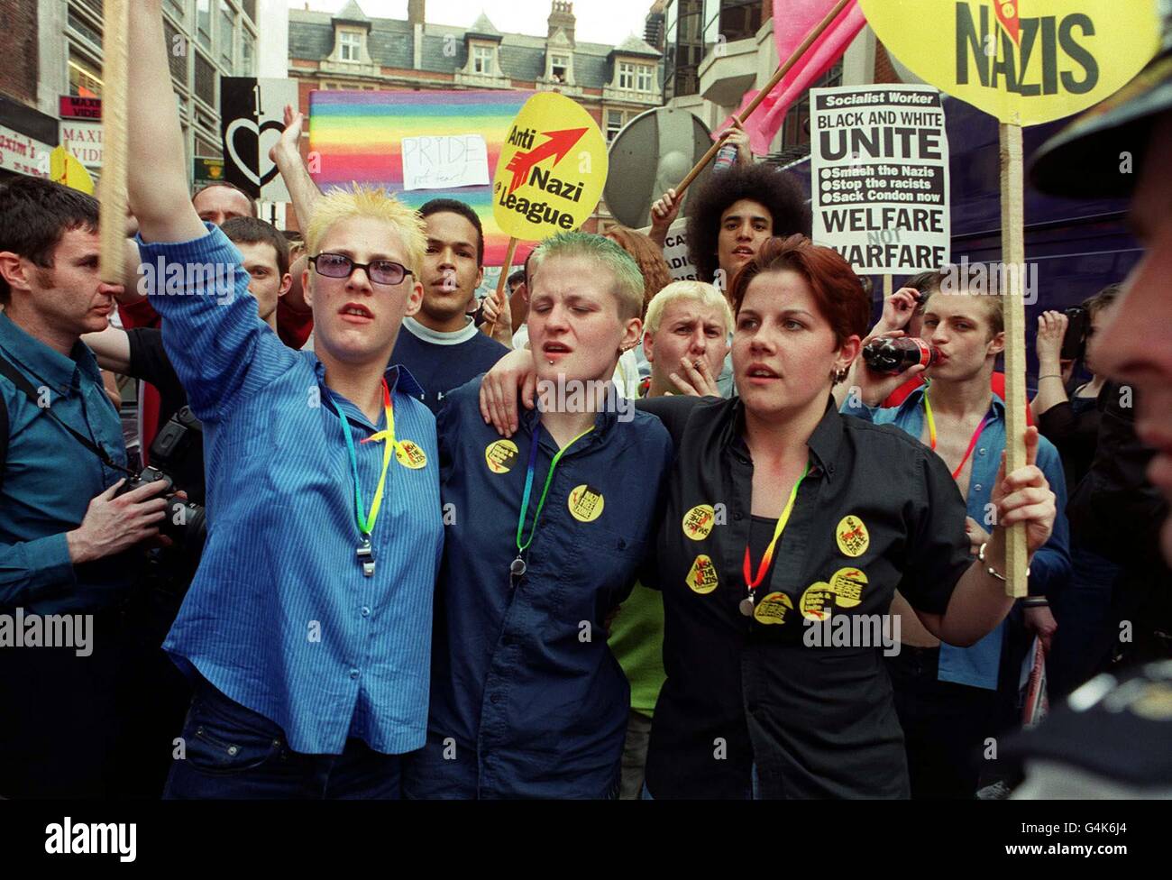 Demonstrators march through Westminster, London, in protest at the Brixton, Brick Lane and Soho nail bombings and racist violence. In the latest blast, three people were killed by a nail bomb explosion in the Admiral Duncan pub (April 30) in Soho, central London. Stock Photo