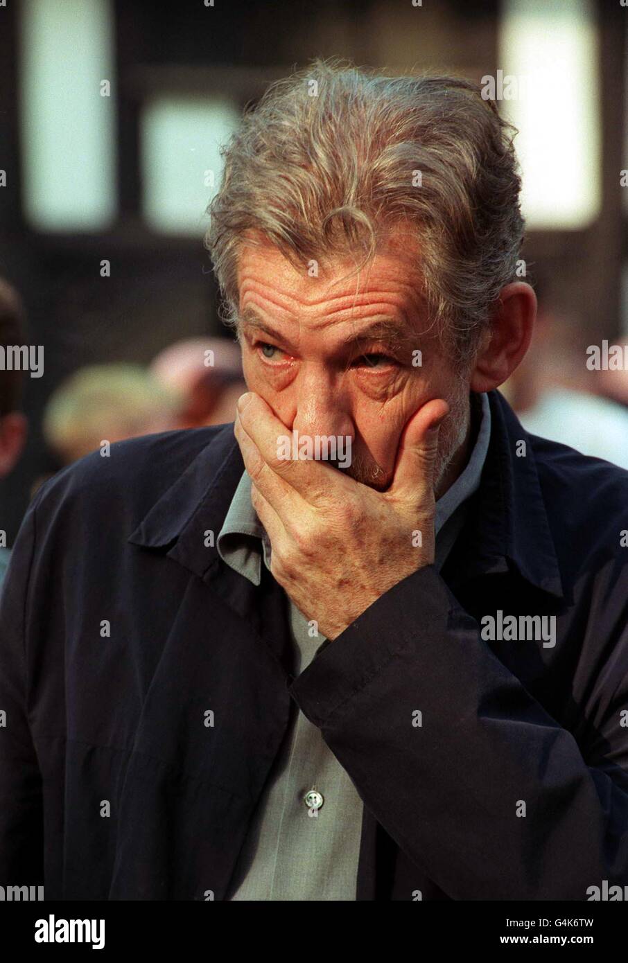 Actor Sir Ian McKellen appears distressed during a vigil in Soho to remember the victims of the April 30 nail bomb explosion in the Admiral Duncan pub. The vigil was organised by the London Gay Men s Choir and held in a leafy Soho Square. Stock Photo