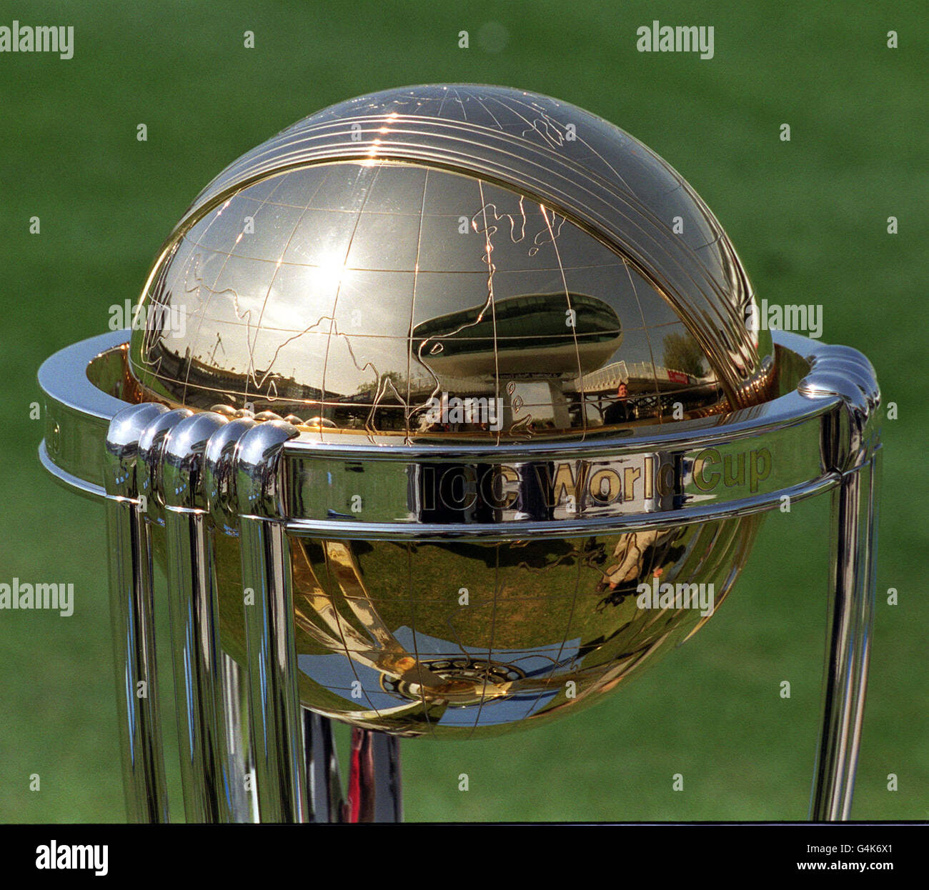 The cricket World Cup trophy reflects the new Natwest Media Centre, during a photocall at Lord's Cricket ground in London. The Cricket World Cup tournament is due to start in England on May 14. Stock Photo