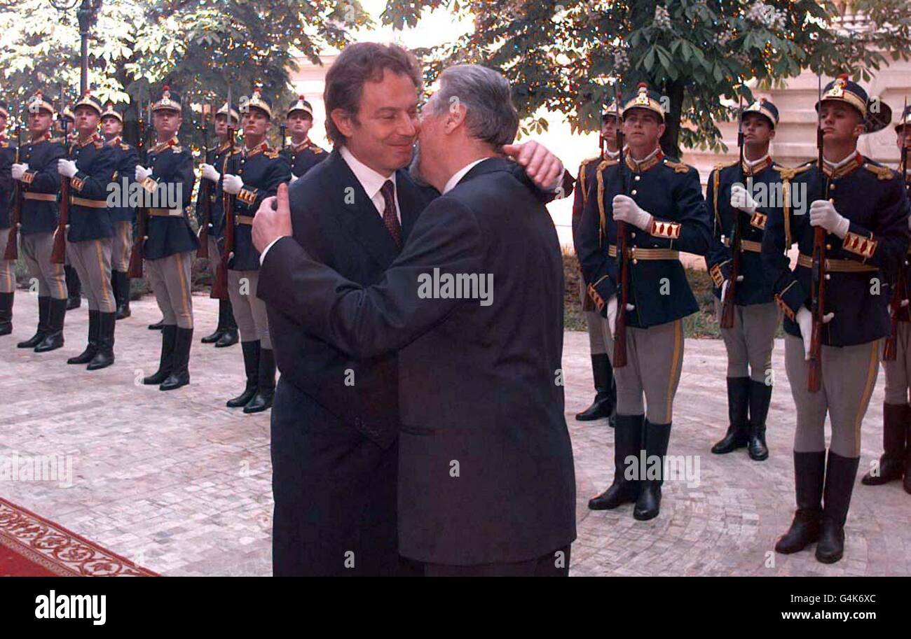 Britain's Prime Minister Tony Blair (left) is greeted by Romanian President Constantinescu at the Cotroceni Palace, on the second day of Mr Blair's visit to the Balkan region. Stock Photo