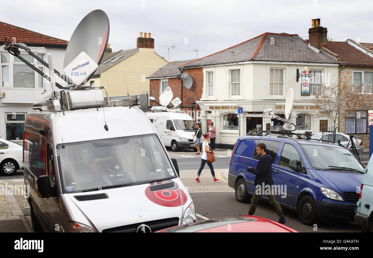 Television satellite trucks surround the Red, White & Blue pub in Portsmouth following landlady Karen Murphy's victory over broadcasting rights at the European Court of Justice today. Stock Photo