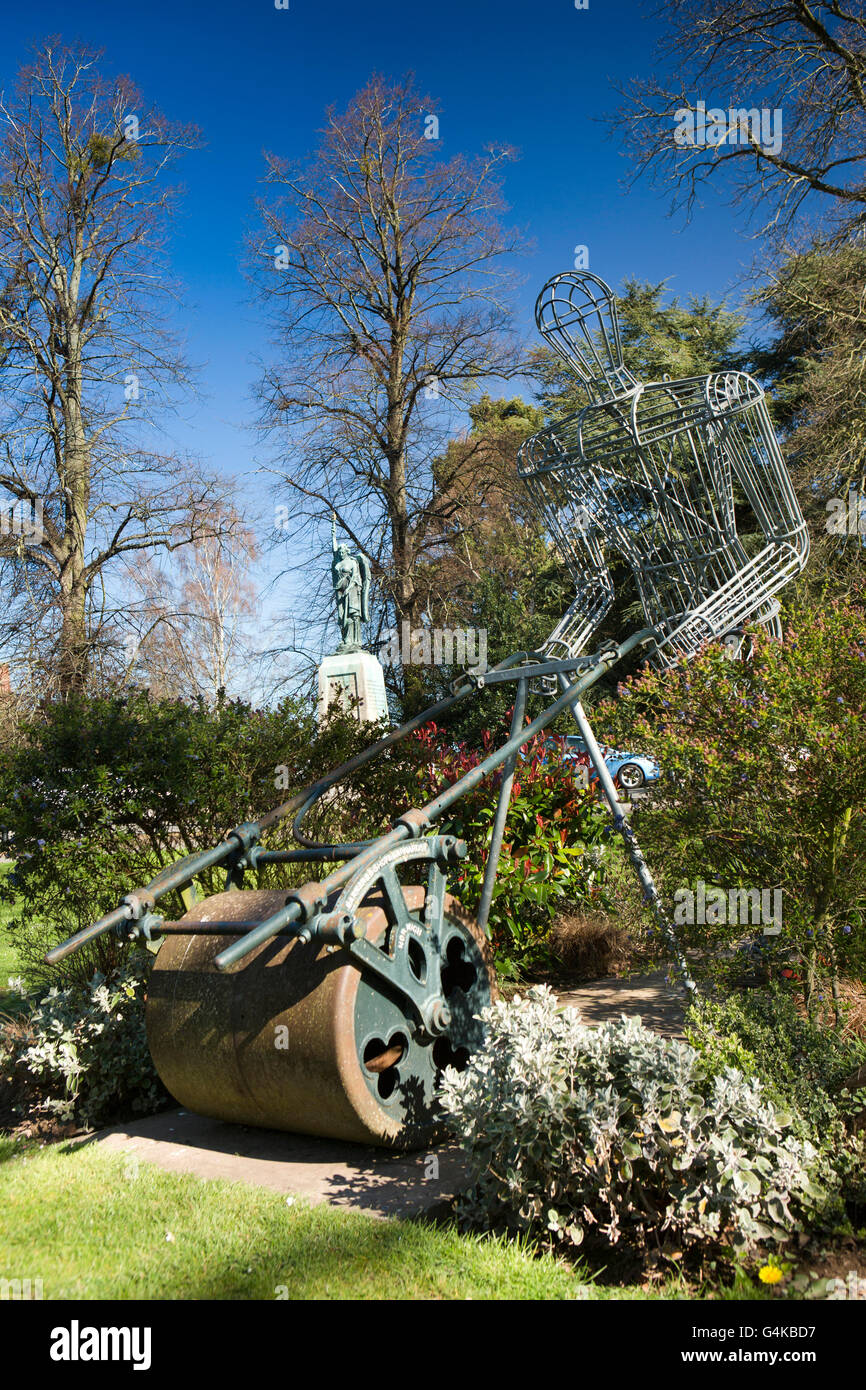 UK, Herefordshire, Leominster, Grange Park, metal sculpture of Mr Granger, mowing grass Stock Photo