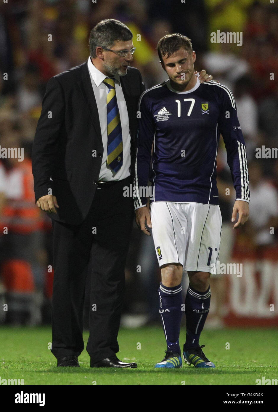 Scotland manager Craig Levein consoles David Goodwillie after the UEFA Euro 2012 Qualifying match at the Estadio Jose Rico Perez, Alicante, Spain. Stock Photo