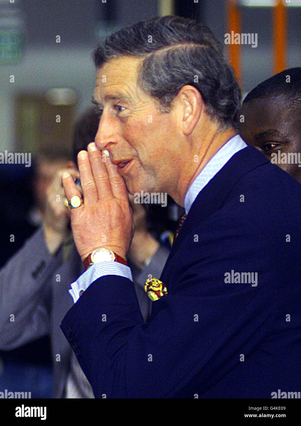 Prince Charles has a quiet word with an employee, as he opens the Dudley Stationery Distribution Centre, at Bow East London. Dudley has earned Royal Warrants to supply stationery for both The Queen and The Prince of Wales. Stock Photo