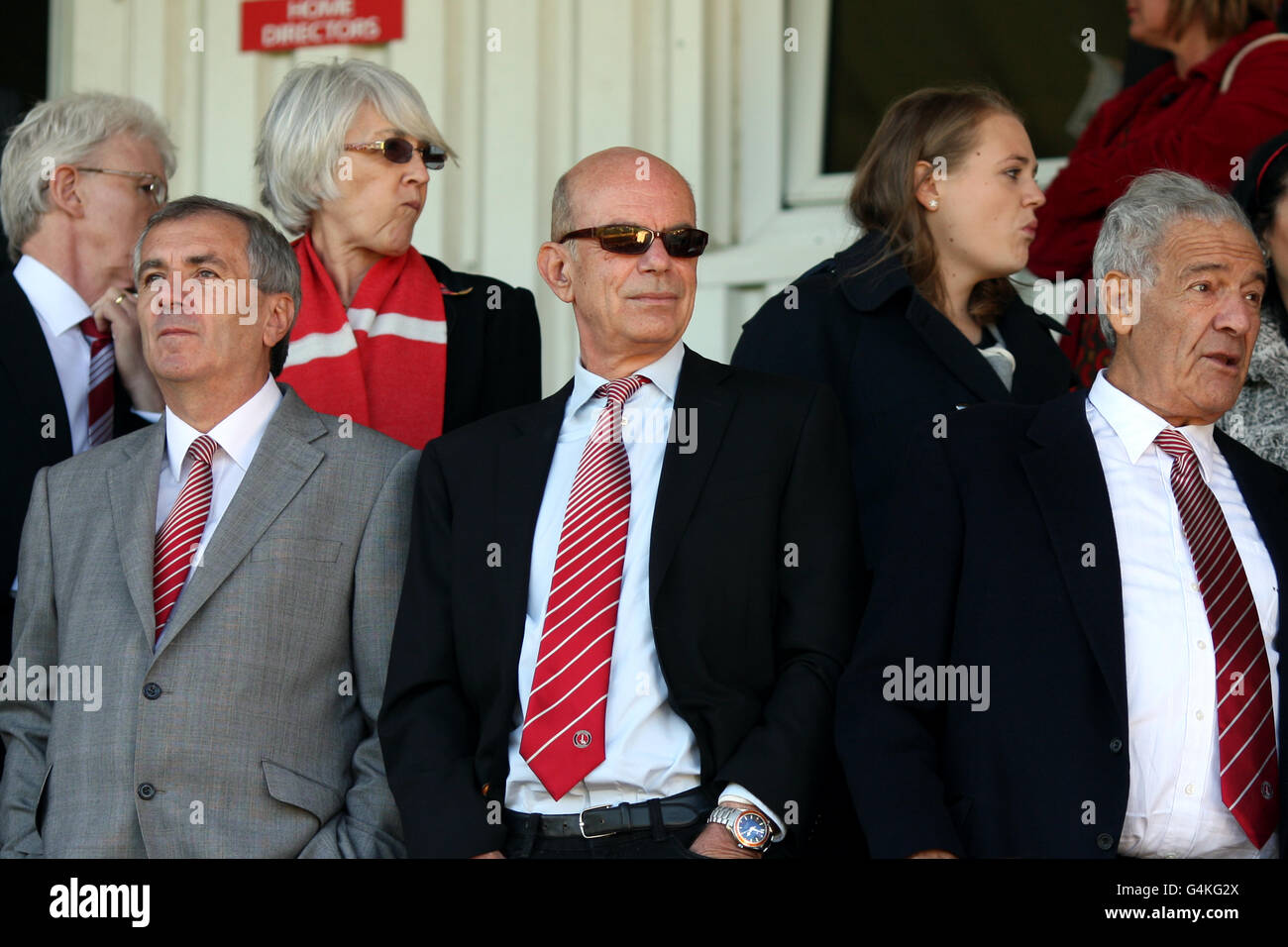 Charlton Athletic director Richard Murray (centre), executive vice-chairman Peter Varney (left) and life president Sir Maurice Hatter (right) in the stands Stock Photo