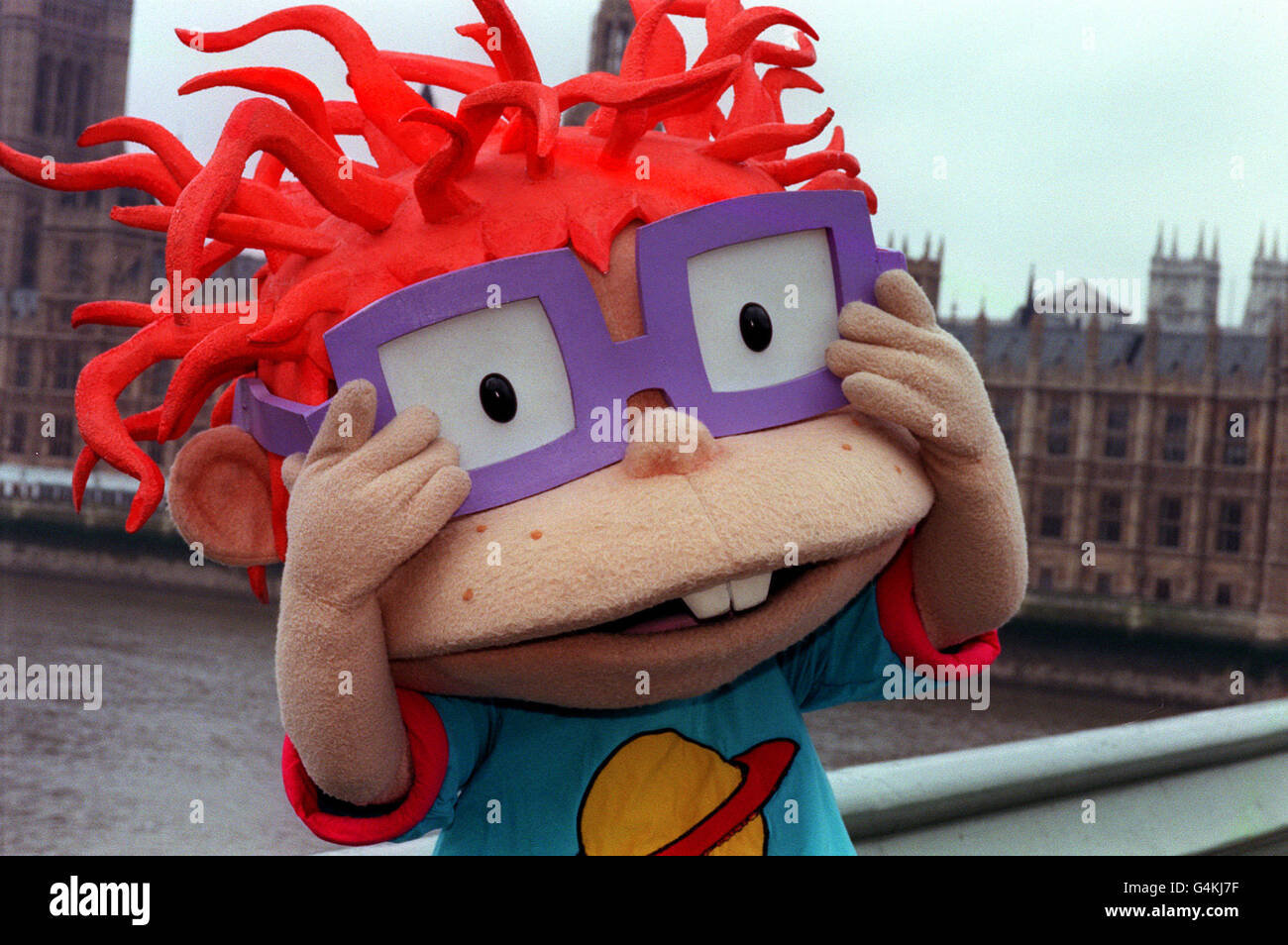 Chuckie From The Children S Television Cartoon Show Rugrats Enjoys A Trip To Westminster Bridge In London By The Houses Of Parliament To Launch Rugrats A Live Adventure The Cartoon Favourites Are
