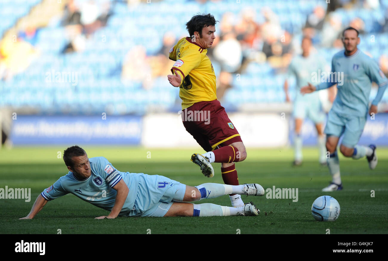 Coventry City' Sammy Clingan and Burnley's Keith Treacy (right) in action during the npower Football League Championship match at the Ricoh Arena, Coventry. Stock Photo