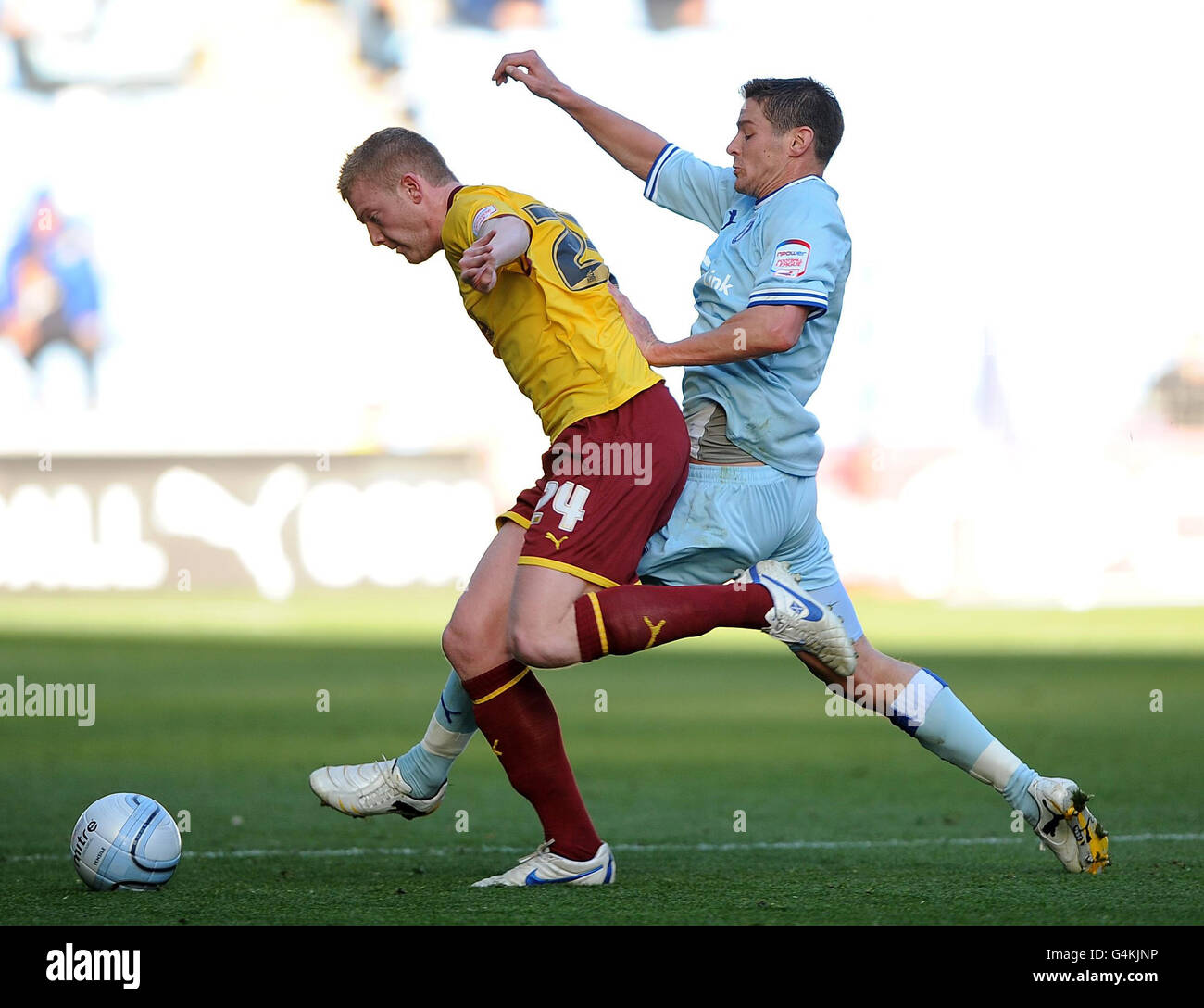 Coventry City's Lukas Jutkiewicz and Burnley's Brian Easton (left) in action during the npower Football League Championship match at the Ricoh Arena, Coventry. Stock Photo