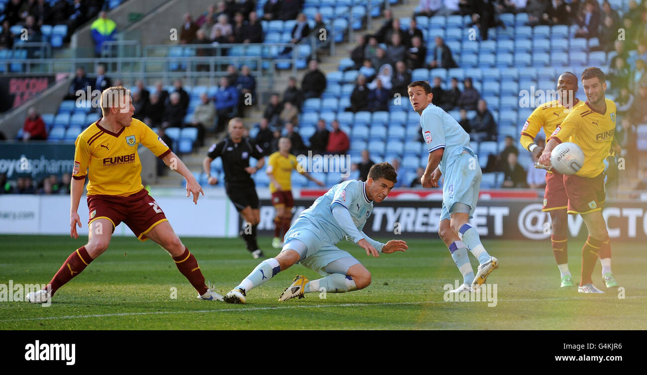 Coventry City's Cody McDonald heads the opening goal of the game against Burnley during the npower Football League Championship match at the Ricoh Arena, Coventry. Stock Photo