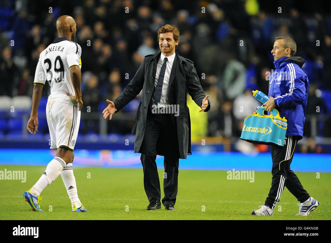 Chelsea manager Andre Villas-Boas (centre) celebrates after the final whistle with Nicolas Anelka Stock Photo