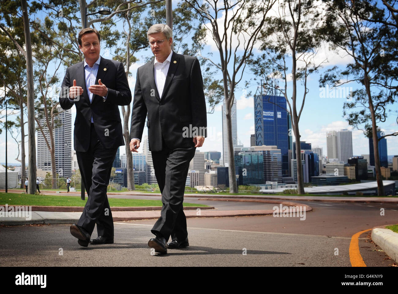 Prime Minister David Cameron and Canadian Prime Minister Stephen Harper take a walk in Perth during a 'Retreat Session' at the Commonwealth Heads of Government Meeting, Western Australia today. Stock Photo