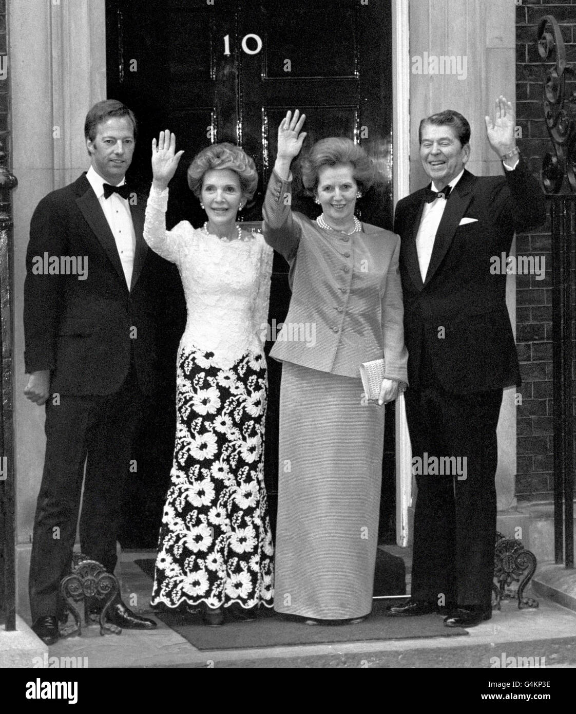 Left to right, Mark Thatcher, Nancy Reagan, Prime Minister Margaret Thatcher and former American President Ronald Reagan outside 10 Downing street, before sitting down to dinner. Stock Photo